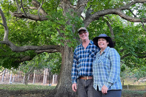 Mark and Denise Wren in their walnut orchard